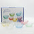 Gold Rimmed Colored Glass Bead Dot Bowl set in various colors displayed in a box.