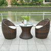 Garden Lounge Wicker Furniture Set featuring stylish chairs and modern round table by the water.