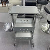 Aluminium Salon Trolley with three storage trays, designed for organising tools in salons and beauty studios.