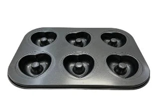 Non-Stick Heart Shaped 6-Cup Muffin Tray with six heart-shaped cavities for baking themed desserts.