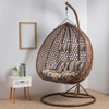 Top Quality Outdoor Magic Rattan Single Sofa Chair featuring a modern design with comfortable striped cushions.