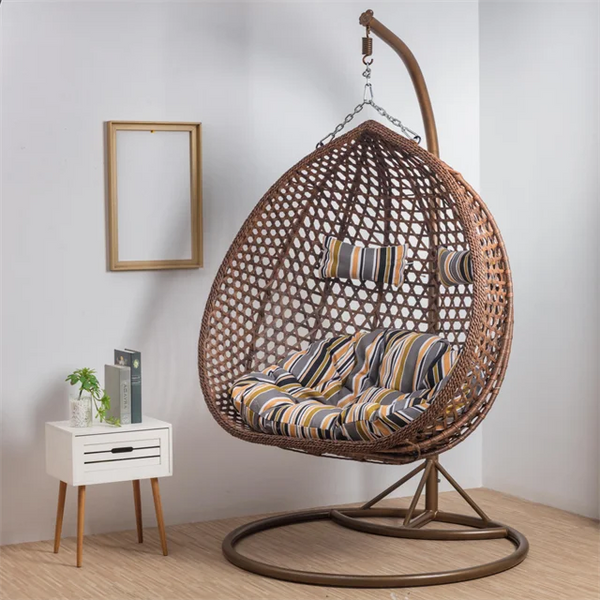 Top Quality Outdoor Magic Rattan Single Sofa Chair featuring a modern design with comfortable striped cushions.