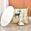 Modern MDF Veneer Dining Table: Stylish modern decor featuring a gold wire basket, white lid, and decorative cushion with a stag design.