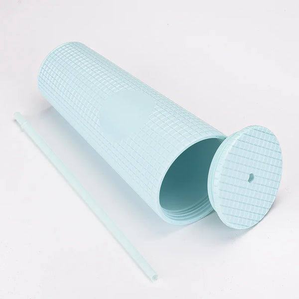 Matte Black Studded Bling Cup Tumbler showcasing a textured design with a straw and lid for stylish hydration.