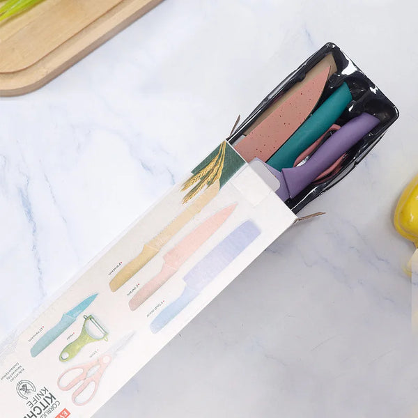 Non-Stick Stainless Steel 6 Piece Knife Collection inside sleek packaging on marble countertop.