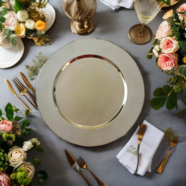 Stylish PP Charger Plate elegantly enhances a beautifully arranged table setting with floral arrangements and fine tableware.