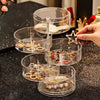 Clear 360 Rotatable Jewelry Box showcasing jewelry organization and accessibility on a stylish display.