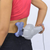 Using the 8-Head Infrared Massage Hammer for back pain relief and relaxation