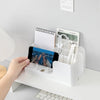 Plastic Stackable Office Desk Organizer with phone holder, stationery, and notepad in a clean workspace setting.