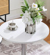 Adjustable Height Bar Table with Metal Round Top featuring a sleek design with flowers and decor.