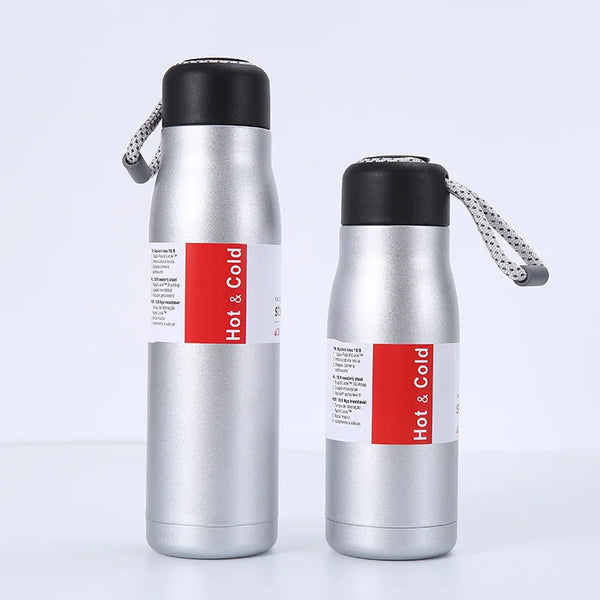 Stainless Steel Vacuum Insulated Flask set, ideal for keeping beverages hot and cold, featuring a sleek design and portable functionality.