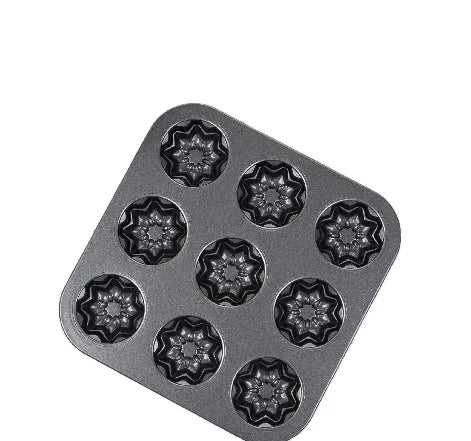 Non-Stick 9-Cavity Square Muffin Pan with decorative fluted edges for baking uniform treats.