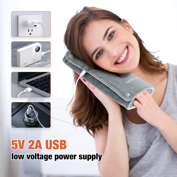 Smiling woman using Graphene USB Hand Warmer Bag, highlighting 5V 2A USB low voltage power supply features.