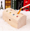 Magnetic Wooden Catching Insects Fishing Toy with colorful beads for kids' play and learning on soft surface.