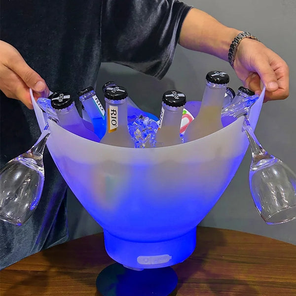 7L Bluetooth LED Ice Bucket with Subwoofer filled with drinks and lit up in blue at a party.