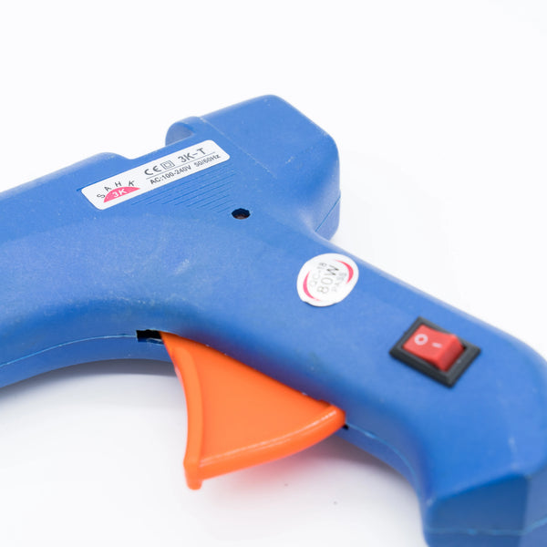 High Quality Adjustable Temperature Hot Melt Glue Gun with blue handle and orange trigger for precise adhesive control.