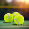 Three Anti-abrasion Practice Tennis Balls on a court, designed for durability and performance during training.