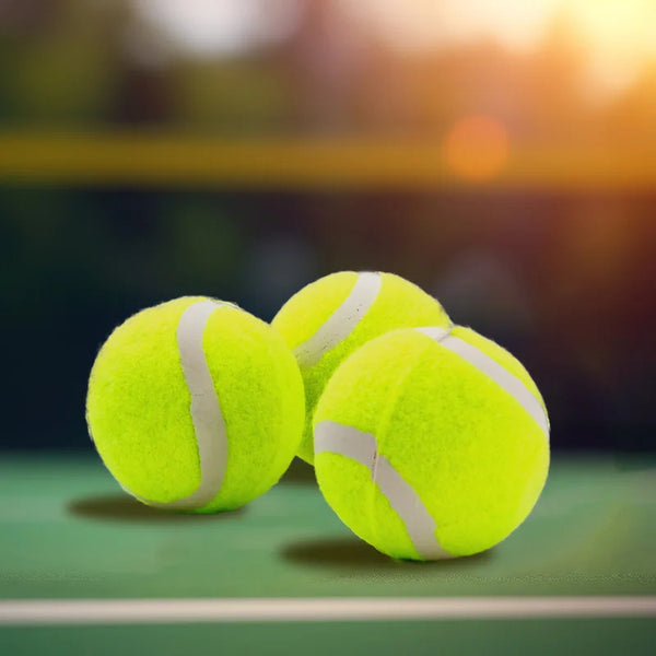 Three Anti-abrasion Practice Tennis Balls on a court, designed for durability and performance during training.