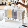 6 Compartment Dry Food Dispenser with various dry foods organized in clear compartments in a kitchen setting.