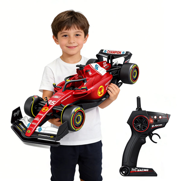 Boy holding an F1 App-Controlled High Speed RC Car with remote control in hand.