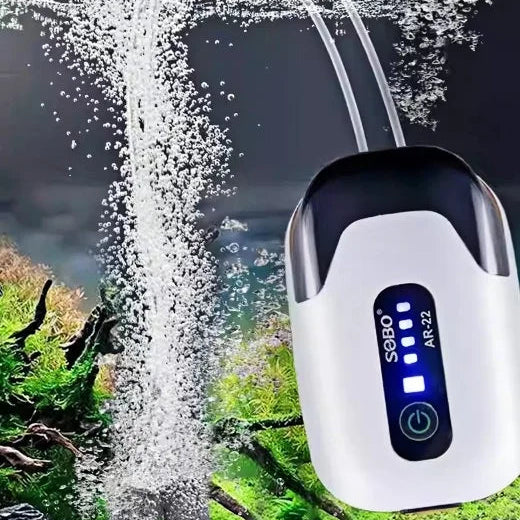 Portable Aquarium Oxygen Pump providing air flow in a well-maintained aquarium with bubbles and aquatic plants.