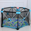 Hexagon Shape Infant Portable Playpen with colorful balls and a toy, perfect for safe playtime indoors or outdoors.