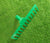 14 Teeth Green Garden Rake on green grass surface, perfect for leveling soil and clearing garden debris.