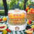 Commercial 5 Tray Food Dehydrator with colorful fruits set outdoors on a checkered tablecloth.