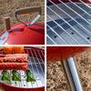 Close-up of Portable Stainless Steel Charcoal BBQ Grill showing cooking surface and grilled vegetables and meats.