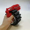 Manual Soft Bullet Toy Blaster with Rotating Drum in a child's hand featuring a red and black design.