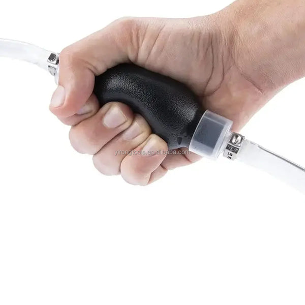Close-up of a hand gripping the handle of an Automotive Manual Fluid Siphon Pump for liquid transfer.