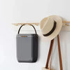 10L Premium Insulated Travel Cooler Box hanging on a wall next to a hat and bag.