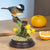 Decorative Voice Control Simulation Home Decorative Toy featuring a bird on a branch with flowers and fruit.