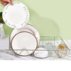Metal Wire Dish Drying Rack with plates being placed for drying in a modern kitchen setting.