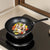 32cm Non-Stick Carbon Steel Iron Wok with colorful vegetables and clams cooking on an induction stove top.
