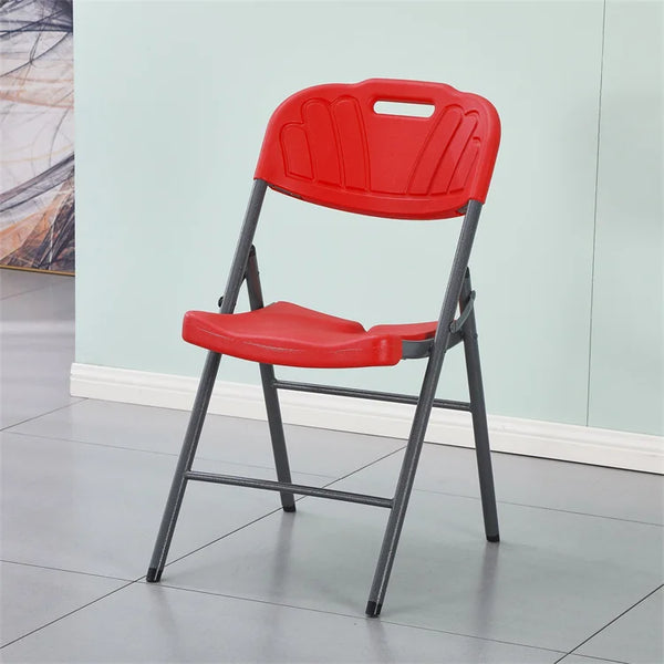 Foldable Plastic Outdoor Chair with Metal Frame in red color on a tiled floor against a light blue wall.