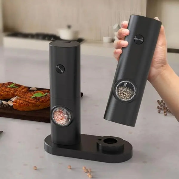 Electric Salt & Pepper Grinder Set displayed on a kitchen counter, showcasing its sleek design and ease of use.