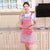 Strap Apron with Adjustable Neck Strap shown in a kitchen setting, featuring floral design and functional pockets.
