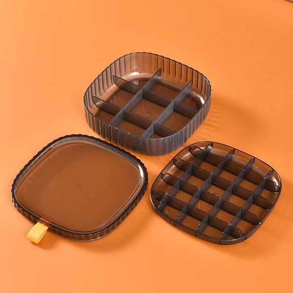 Portable Multi-Layer Plastic Jewelry Storage Box with compartments for organized jewelry and accessories.