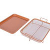 Rose gold stainless steel lunch box food container with removable mesh basket and flat tray.