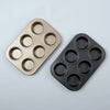 6 Cup Non-Stick Carbon Steel Muffin Pan in gold and black colors, perfect for baking muffins or cupcakes.