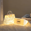 Crystal Bag USB Night Lamp illuminating a cozy bedroom setting with a soft, ambient glow.