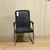 Mesh Back Visitor Office Chair with Armrests set against a simple backdrop, showcasing its design and functionality.