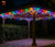 5m 240 LED Colourful Waterproof String Light illuminating a gazebo with vibrant colors at night.