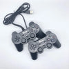 USB Wired Dual-Vibration PC Game Controller with dual controllers and USB cables on a white background.