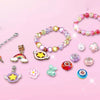 Colorful beads and charms from the 3-in-1 DIY Beaded Jewelry Making Set for crafting unique jewelry.