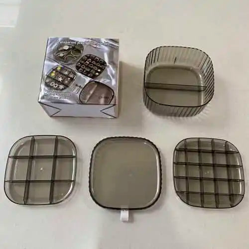 3-Layer Jewelry Storage Box with various compartments and a box for organizing jewelry accessories.
