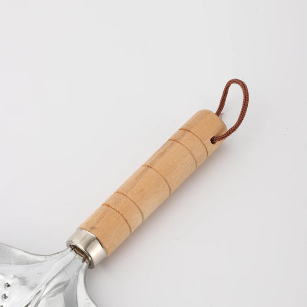 Close-up of a double-layer iron silver anti-hot heat diffuser featuring a wooden handle.