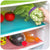 Multi-Purpose Anti-Slip Shelf & Fridge Mat 6-Pack featuring fresh vegetables and drinks organized in a refrigerator.