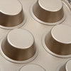 Close-up of the 6 Cup Non-Stick Carbon Steel Muffin Pan showcasing its surface and cup design.